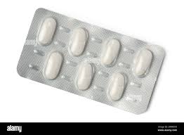 Close up oval white pill hi-res stock photography and images - Alamy