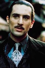 Godfather üçlemesi'nin ilki 1972'de, ikincisi 1974'te ve üçüncüsü 1990'da çekildi. Robert Deniro As The Young Godfather The Godfather Part Ii The Godfather Godfather Movie