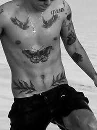 Rose tattoos continue to be one of the most popular tattoo ideas for women. Stylesloud Harry Styles Tattoos Harry Styles Harry Styles Wallpaper