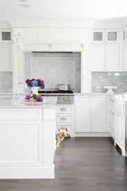 Enviable Designs Fabulous Kitchen Features Shaker Cabinets Paired With White Quartz Counte White Kitchen Design House And Home Magazine Kitchen Design Trends