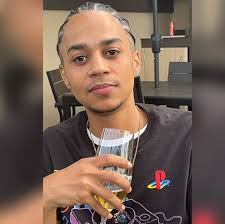 Drake purchases Tupac's chain and shows it off