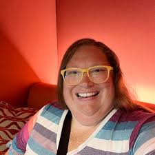 Who owns the truck with Christmas lights driving around Red Oak Iowa?