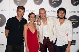 She serves as the lead vocalist and guitarist of the mercury prize winning indie rock band wolf alice. Wolf Alice Talk Second Mercury Prize Nomination And Backing Arctic Monkeys News Diy