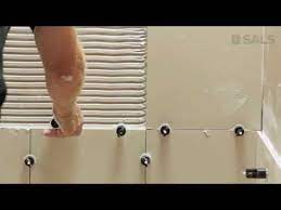 Sals Simple Accurate Levelling System Diy How To Install Large Format Wall And Floor Tiles Youtube Tile Leveling System Tile Installation Granite Tile