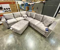 It's covered in a grey fabric, and paired with accent pillows. Costco Deals Thomasvilleofficial Couch With Storage Facebook