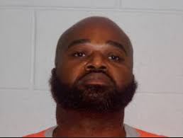 GREENE COUNTY, NC) -- Today, 41-year-old Wilbert Baldwin was served by  Greene County Sheriff's Deputies with a murder warrant for the death of  another inmate, Ernest Nichols,