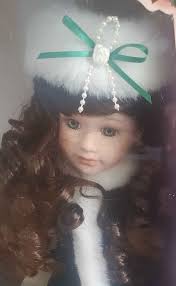 This beautiful 1994 Victorian Collection Porcelain Doll by Melissa Jane is  a must have for any collection. The Doll comes brand new in it's original  box complete with delicate velvet clothing and