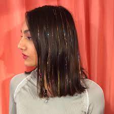 We Found The Cutest Hair Tinsel Hairstyles On The Internet From Fairy Hair Tinsel To Unicorn Hair Tinsel Looks You Re Boun Hair Tinsel Hair Trends Fairy Hair