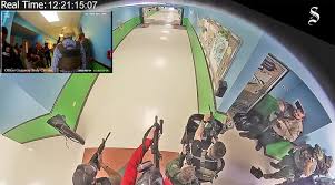Cops ran away from gunshots during Uvalde school shooting: video