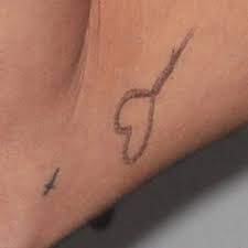 My favorite piece is what we all just got — it's a tour tattoo. Celebrity Noose Tattoos Steal Her Style