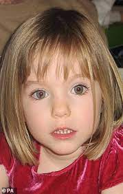 Kate mccann, madeleine's mother, is seen against the background of her daughter's photo. M Rzxlyx4r 8jm