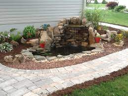 Small Pond And Waterfall In The Front Yard Small Backyard Ponds Waterfalls Backyard Pond Landscaping