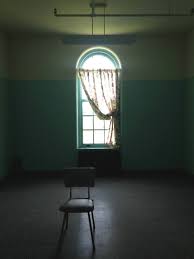 single chair in a room within the grandview building at the willard asylum near seneca lake willard asylum willard asylum