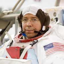 NASA astronauts Tracy C. Dyson and Mike Barratt are back inside the  International Space Station after U.S. spacewalk 90 ended early Monday due  to a water leak in the service and cooling