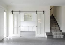 This office doors section is designed as a taster of what is… White Home Office With Glass Paned Sliding Doors On Rails Transitional Den Library Office