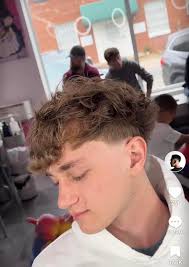 Who is the best barber in Greenville for a specific haircut?