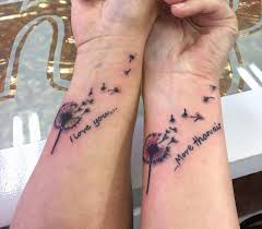 The tattoo represents the unbroken bond, unbreakable affection, or unbound love that a mother and children share. Mother And Son Tattoo Small