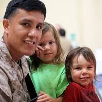 Petty Officer 2nd Class Jorge Arreola (left), a corpsman