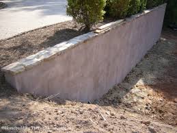 It may also be carved and formed to look like mortared stone depending on your taste. How To Improve The Look Of A Concrete Retaining Wall The Homebuilding Remodeling Guide