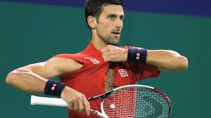 Novak djokovic sensationally threw his racket into a fence and left a hole while playing doubles at indian wells. Novak Djokovic Tears His Shirt Smashes Racket In Shanghai Masters Semifinal Defeat Youtube