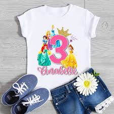 The disney princess characters have entertained young and old with beloved stories that have shown generations how to live with courage, grace, determination, and kindness. Disney Princesses Birthday Shirt