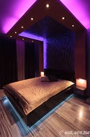 Fancy Looking Hotel Room With A Printed Stretch Ceiling And Rgb Led Lighting Mood Lighting Bedroom Neon Bedroom Romantic Bedroom Lighting