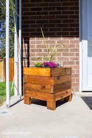 A vertical planter holder which you can easily put together using a you obviously also have the option to add some color to your vertical garden. Build A Square Planter Box From Cedar Twofeetfirst