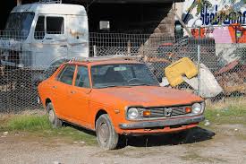 Image result for Herald Yellow 1976 Subaru