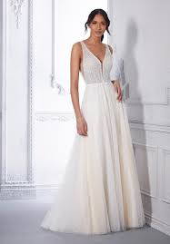 To create such a dramatic look, many ball gown wedding dresses use layers of tulle or crinolines, a type of stiff underskirt. The Morilee Signature Bridal Collection Morilee Germany