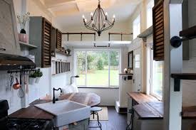 Tiny House Packs Farmhouse Chic Into 240 Square Feet Curbed How to convert square feet to square meters?