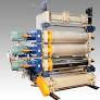 Custom double-layer vinyl flooring production line from www.yeshaextrusionmachineries.com