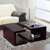 A solid wood coffee table placed right at the centre of the living room is nothing less than a visual treat. 1