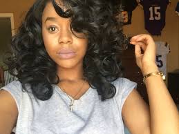 Use bundles that mix powerful blue reflexes and blend them with your naturally curly hair. Curly Weave Bob Shoulder Length Weave Hairstyles Hair Styles Curly Weave Hairstyles Short