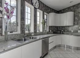 Granite counter is a fantastic mix for white cabinet. 30 Gray And White Kitchen Ideas Designing Idea