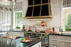 Notice that the backsplash is a mix of both light, medium and dark tones, which is a great way to transition a high contrast look. Antique White Cabinets French Kitchen Betty Lou Phillips