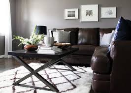 Modern Industrial And Rustic Retreat Grey Walls With Chocolate Brown Couch Brown Living Room Decor Brown Couch Living Room Grey Walls Living Room