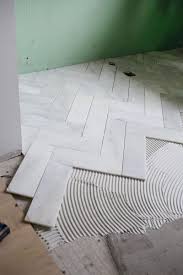 Try This Herringbone Marble Tile A Beautiful Mess Remodel Bathrooms Remodel Flooring