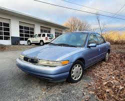 Image result for Portofino Blue 1995 Town Car