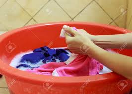 If you want to wash your clothes. Two Hands Washing Clothes In Red Tub Stock Photo Picture And Royalty Free Image Image 37448401