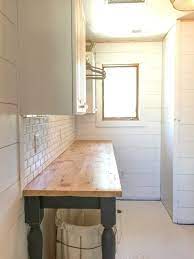 Not only does this laundry room folding station diy have plenty of storage for your laundry cart, but it features diy sweater drying rack drawers. The Perfect Diy Laundry Folding Table Twelve On Main