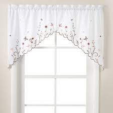 It can be hung alone or combined with longer curtains. These Decorative Tier Curtains Bring A Summer Garden Complete With Flowers And Butterflies To Your Kitchen Window Tiers Valan Swag Valance Valance Curtains