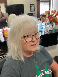 What a transformation !! From a poorly cut uneven bob to gorgeous platinum  rock star shag!! We're still