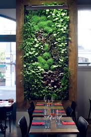 Mur Vegetal Realise Par L Entreprise Construction Exotique Pour Le Restaurant Tartare Co Geneve Suisse Garden Wall Vertical Garden Wall Vertical Garden