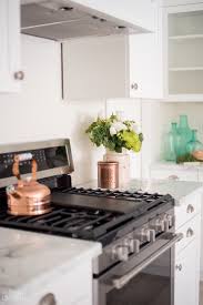 Beautiful shingles (painted in a red exterior paint) and metal roof. Classic Lake Cottage Kitchen Progress With Maytag Appliances Mom S Lake House The Diy Mommy