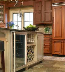 They may contain sinks and appliances or more the island can become a landing zone for the refrigerator, house the main sink or cooktop, or provide seating and bar sinks or wine fridges. Aluminum Kitchen Cabinet Design Kitchen Island With Wine Fridge