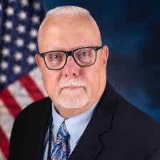 1st sergeant Dowling Watford presents a proclamation to Matt Schott as he  enters the Navy. best wishes to you.