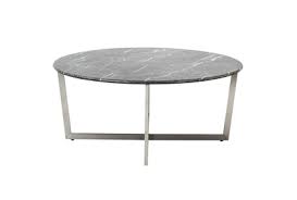 Your outdoor coffee table should reach the same height as the cushions or seat of the accompanying chairs or sofa — or one to two inches in a fluid or circular patio, it can be fun to go with a curved sofa and a round outdoor coffee table. Liv Black Faux Marble 36 Inch Round Coffee Table With Brushed Stainless Steel Base Living Spaces