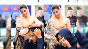 viral video: Maryam Nawaz divides internet with viral video of her fixing  police officers headscarf - The Economic Times