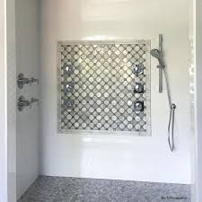 Porcelain showers with marble chair railings on walls. Carrara Chair Rail Tilebar Com