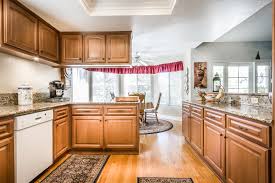 Related questions what kitchen paint colors go with honey oak cabinets? Tips For Pairing The Right Laminate Floor With Oak Cabinets